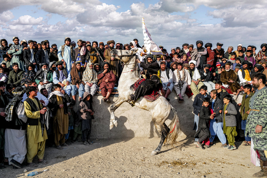 Winning buzkashi rider and horse in Afghanistan — photograph by Laurin Strele