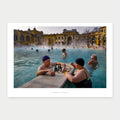 A1 photo poster of two bathers playing chess in a steaming outdoor pool, by Laurin Strele, with a white border and light-grey artist name.