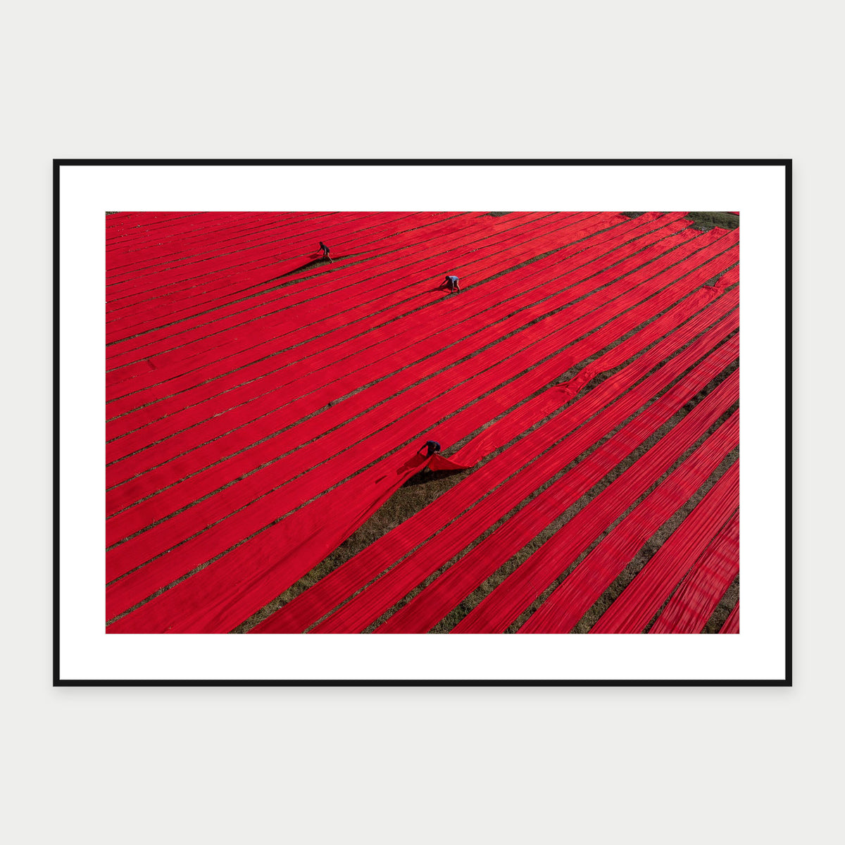 Black-framed display mockup of Red Fields by Laurin Strele; frame shown for illustration.