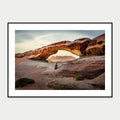 Black-framed display mockup of The Bridge, Wadi Rum by Laurin Strele; frame shown for illustration.
